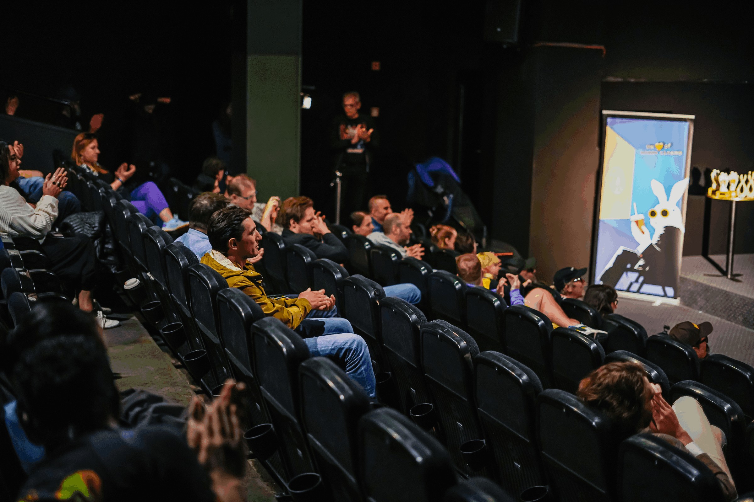 People gathered at a Bitcoin FilmFest 2025 evening event