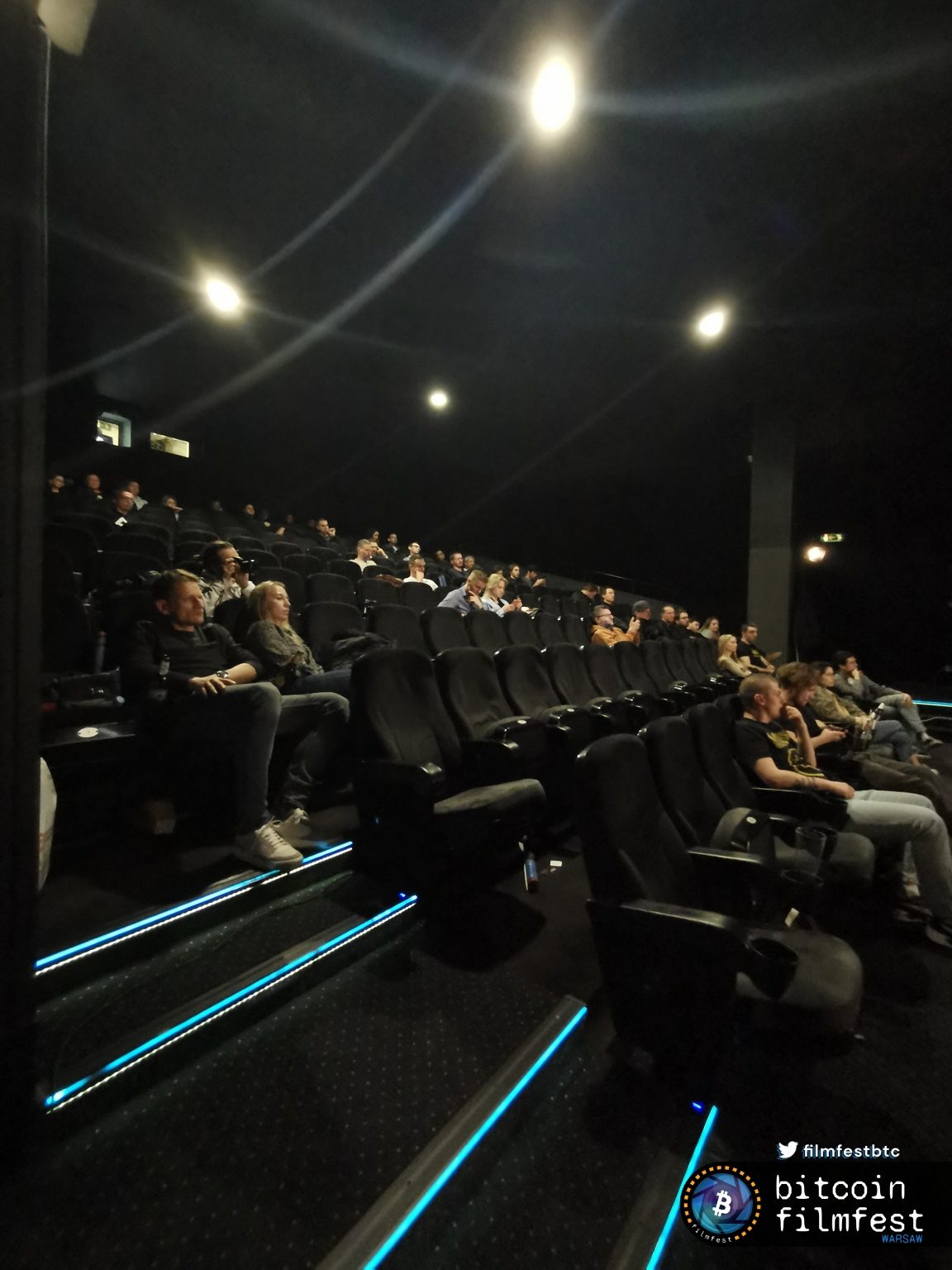 Audience seated in the cinema at Bitcoin FilmFest