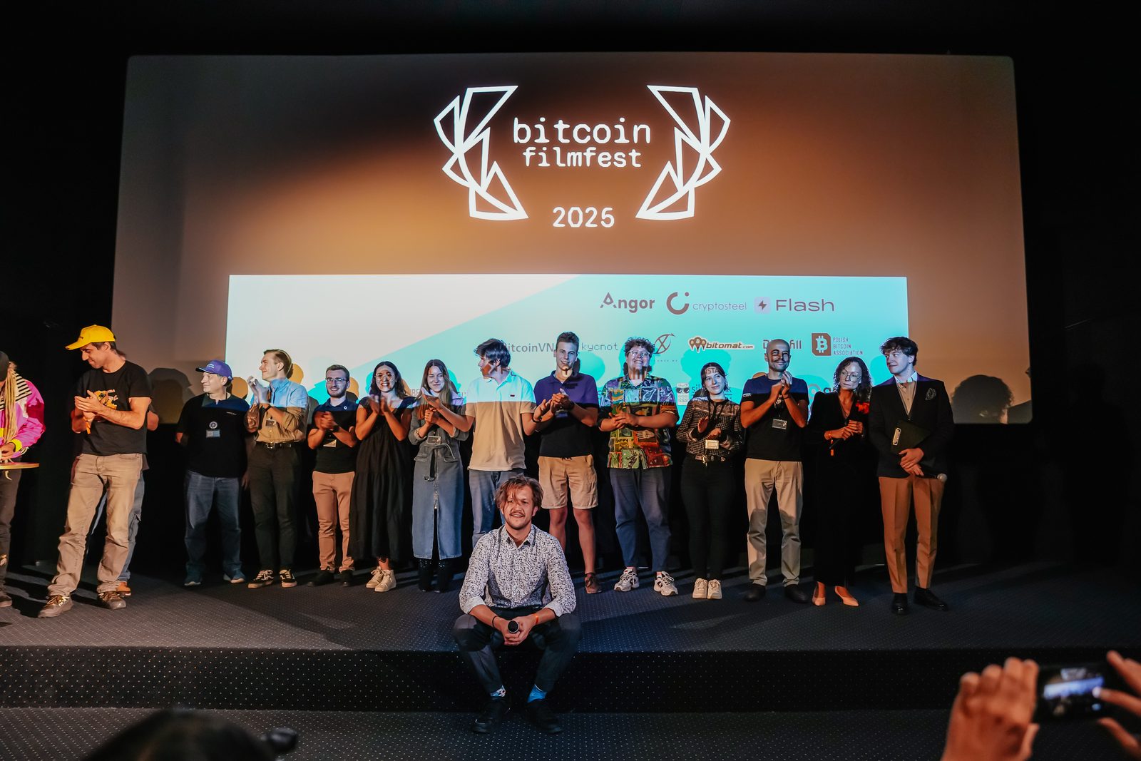 The Bitcoin FilmFest team and guests on stage at Warsaw's Kinoteka