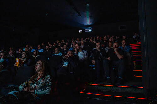 A packed cinema audience
