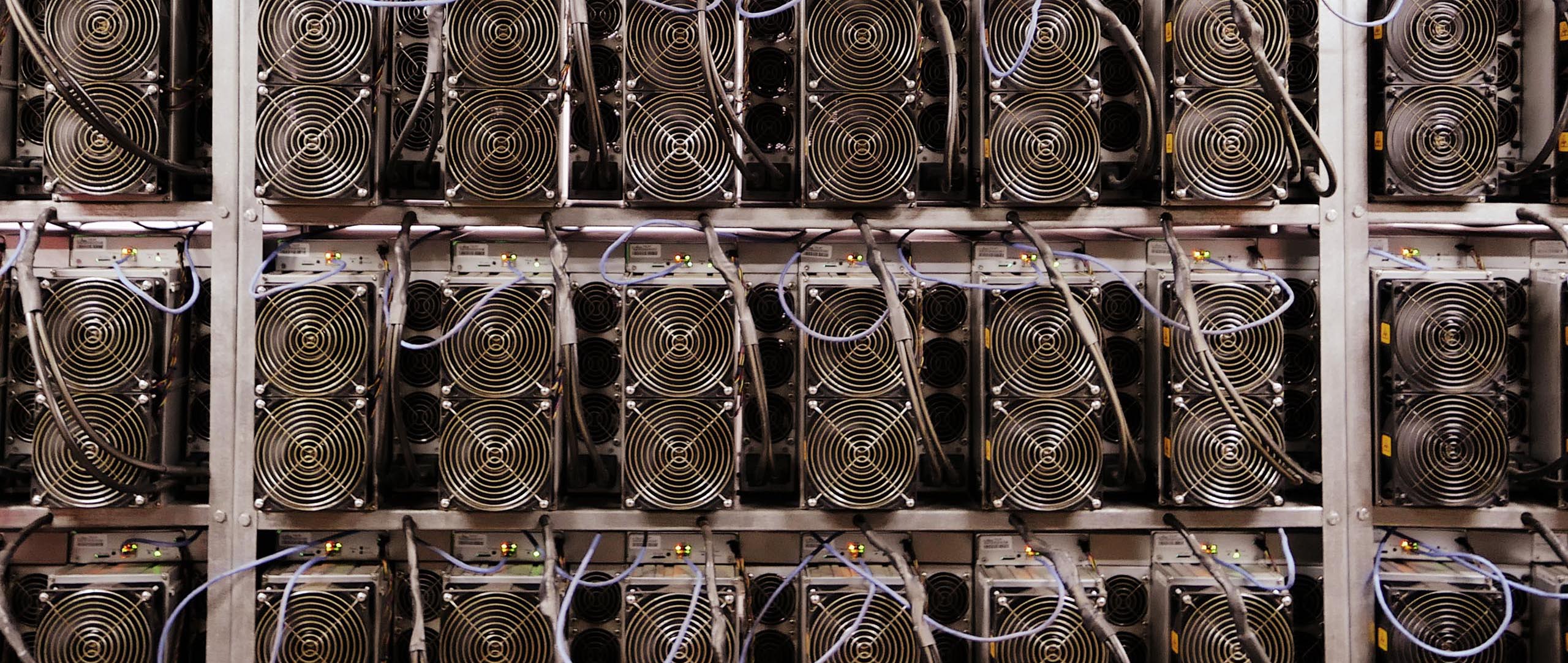 Bitcoin mining hardware in a Dirty Coin promotional still